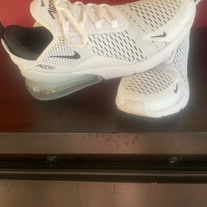 Womens Nike Air Max   Size 11.  Only worn a few times.  Fits more like a 10.